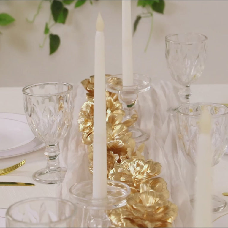 Metallic gold artificial flower garland for table and backdrop decor.