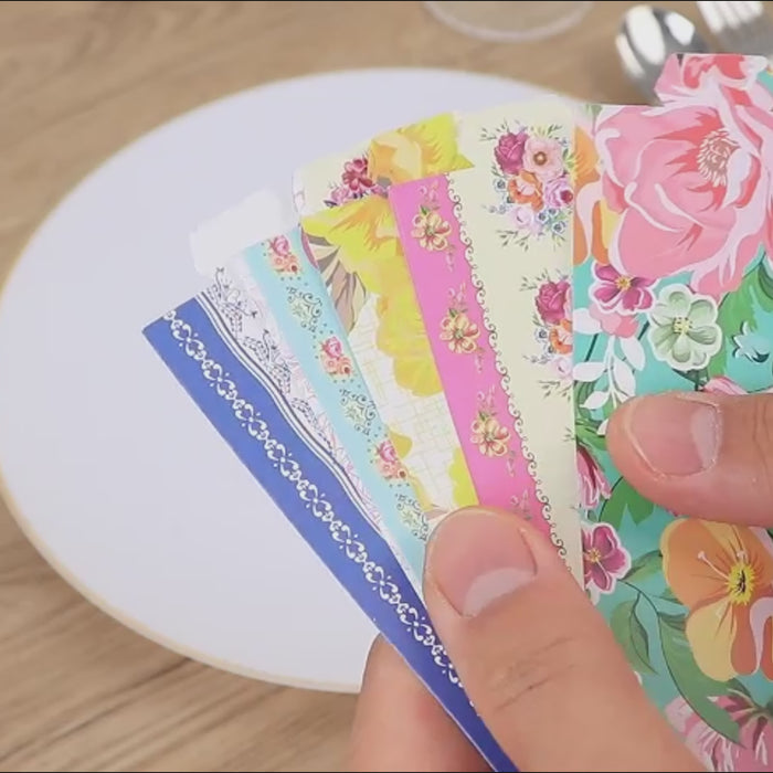 Mixed vintage floral disposable napkin rings for elegant table settings.