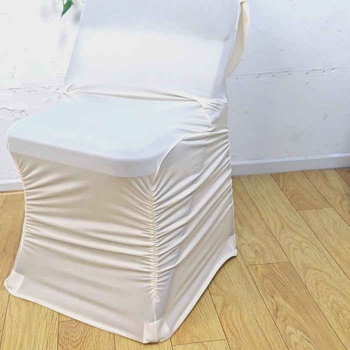 Ivory spandex folding chair cover with ruched swag back and foot pockets.