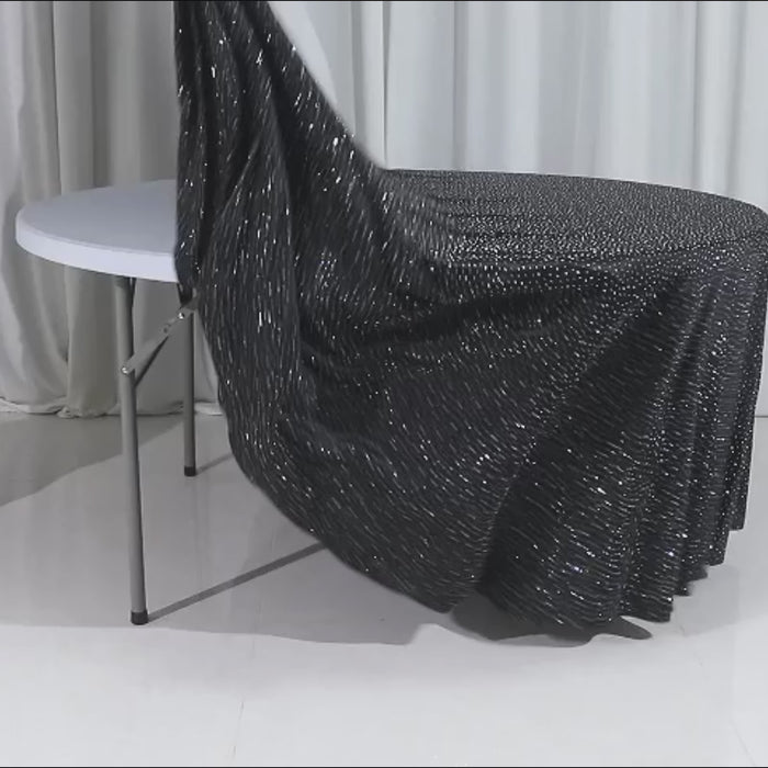 Black tablecloth with rhinestone accents, wrinkle-free and seamless luxury event cover.