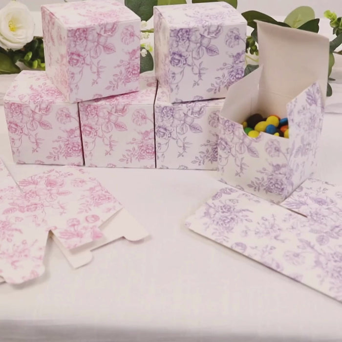 Matte lavender and white party favor gift boxes in French toile pattern.