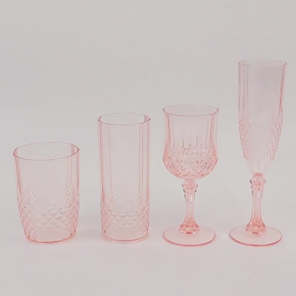 Blush plastic champagne glasses set, shatterproof and elegant for toasting.