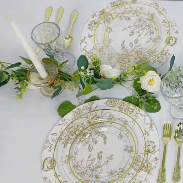 White and gold disposable table placemats in French toile print for elegant dining.