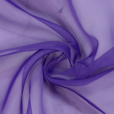 Purple sheer fabric swirl texture background close-up#whtbkgd
