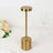 Gold modern table lamp with cylindrical base and round top.