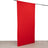 Red fabric backdrop draped on a rod for photography or staging purposes