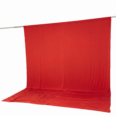 Red fabric backdrop on pole studio background and floor cover