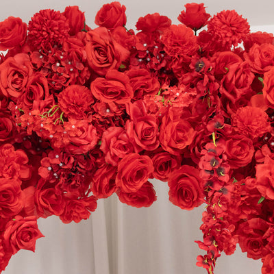 Red floral bouquet arrangement with roses, carnations, and hydrangeas