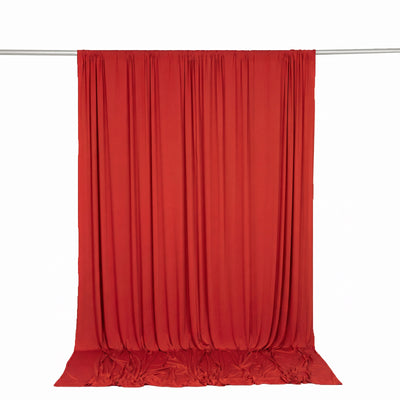 Red sheer curtain backdrop with rod and draped fabric on white background