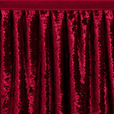 Red velvet stage curtain with rich texture and dramatic folds#whtbkgd