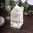 Crystal lantern with LED lights on a wooden table