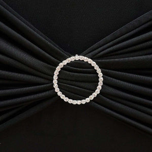 Elegant crystal-embellished brooch on black fabric