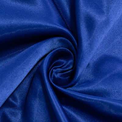Navy blue fabric with a smooth texture, spiraled for visual interest. #whtbkgd
