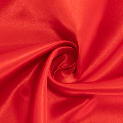 Red satin fabric with a smooth, lustrous finish. #whtbkgd