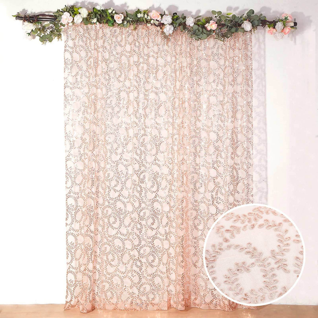 Delicate lace curtain with floral design, shown against a white background.