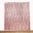 Textured fabric wall hanging with geometric pattern in warm tones