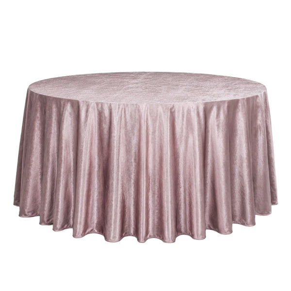 Round blush pink velvet tablecloth on a banquet table