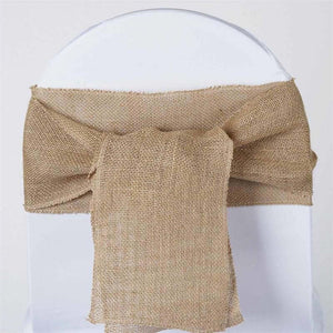 Burlap chair sash tied in a bow on a white chair