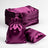 Purple satin drawstring bags stacked on a plain white background.