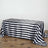 Black and white striped tablecloth on a wooden surface.