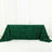 Green floral textured table cover on a plain backdrop.