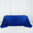 Royal blue rose-patterned tablecloth on a white backdrop.