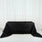 Black rose-patterned tablecloth on a plain surface.