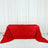 Red rose-pattern tablecloth draped elegantly on a table