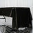 Black satin tablecloth draped elegantly over a table.