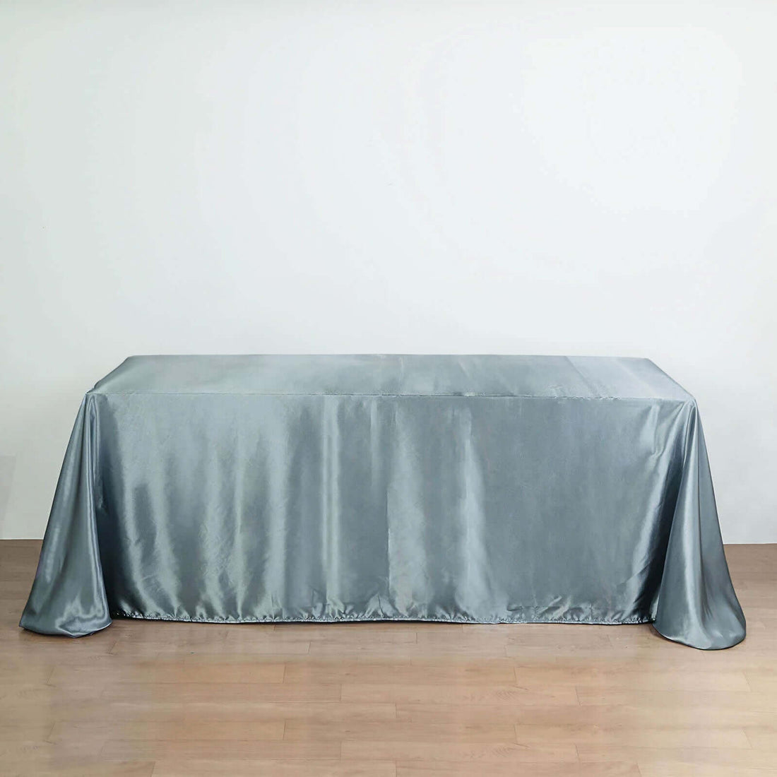 Gray satin tablecloth draped elegantly over a table.