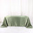 Green satin tablecloth draped elegantly over a table