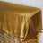 Gold satin tablecloth draping over a table