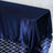 Navy satin tablecloth draped elegantly on a geometric patterned table
