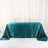 Teal satin tablecloth draped elegantly over a table