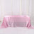 Pink satin tablecloth draped elegantly over a table.