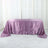 Purple satin tablecloth on a white backdrop