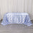 Floral blue tablecloth on a grey wooden floor