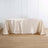 Elegant beige satin tablecloth on a smooth wooden surface