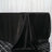 Black satin tablecloth draped elegantly over a table.