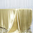 Gold satin tablecloth draping elegantly on a table