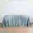 Gray satin tablecloth draped over a table
