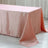 Pink satin tablecloth draped elegantly over a table.
