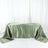 Green satin tablecloth draped elegantly over a table.