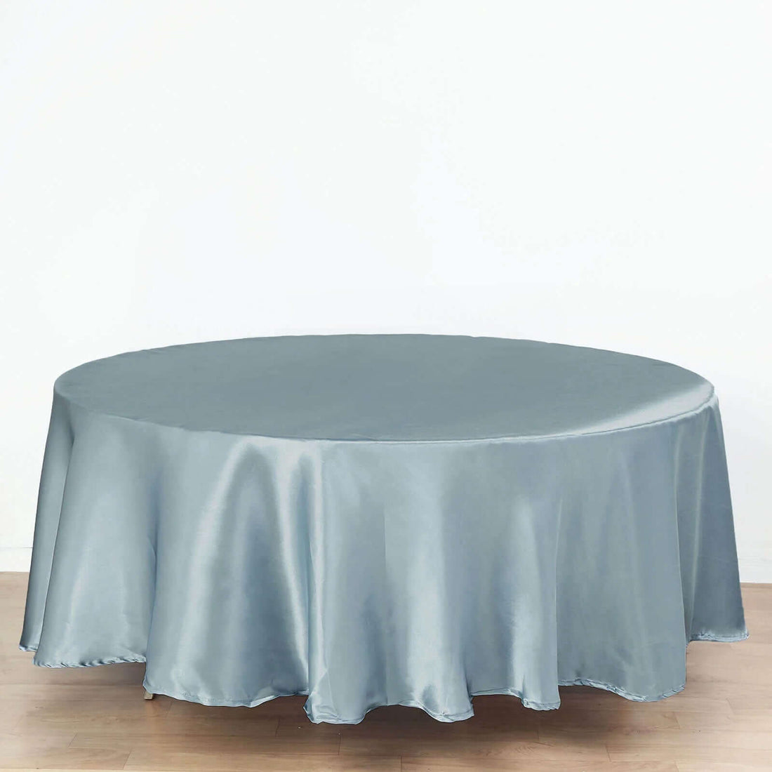 Round satin tablecloth in elegant blue color.