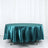 Teal satin round tablecloth draped elegantly on a table.
