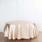 Round satin tablecloth in champagne color on a plain background