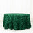 Green rose-patterned tablecloth on a round table.