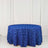 Blue rose-patterned tablecloth on a round table.