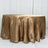 Gold satin tablecloth draped over a round table