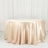 Round satin tablecloth in soft beige color.